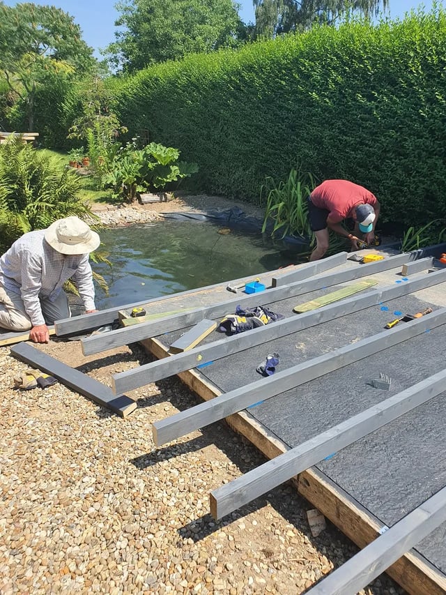 Volunteers helping with roofing